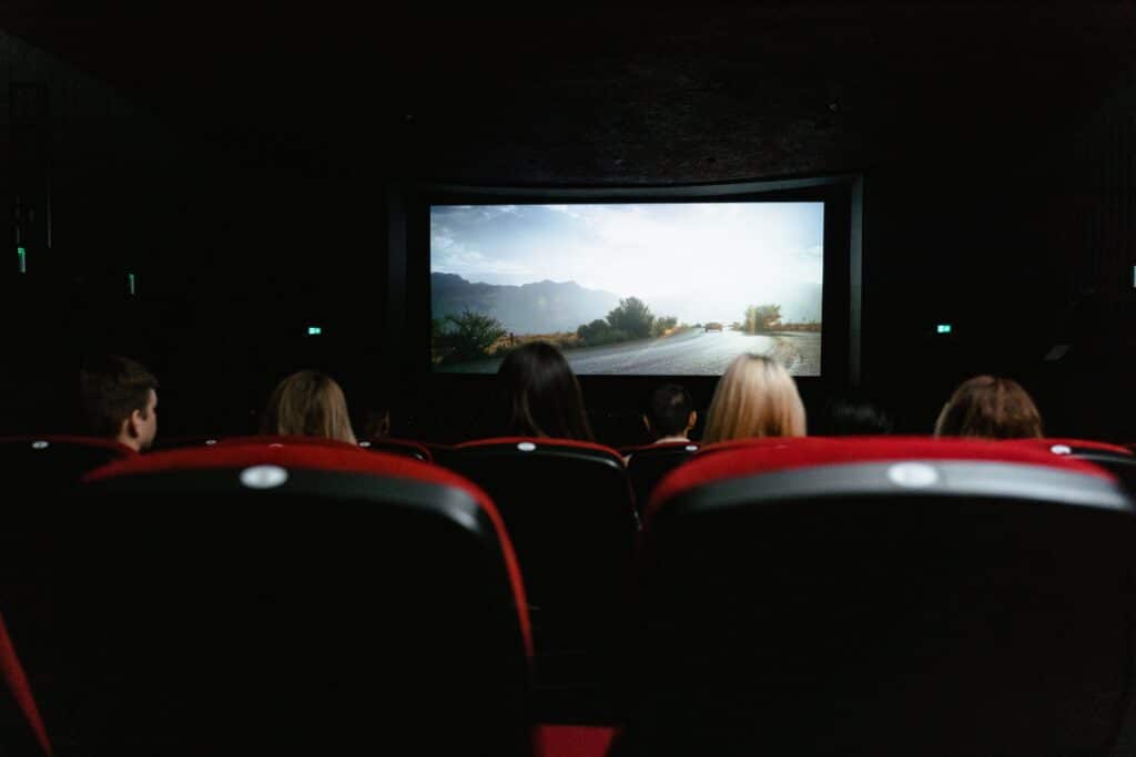 Moviegoers enjoying cinema.